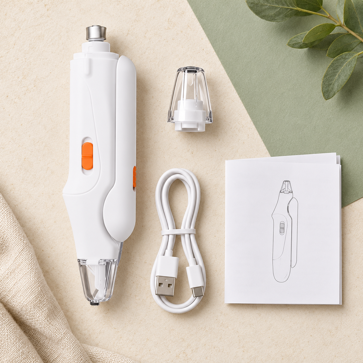 PetOlive nail clipper kit contents arranged on a grooming surface