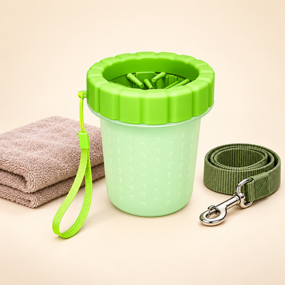 Compact portable paw cleaner beside towel and leash