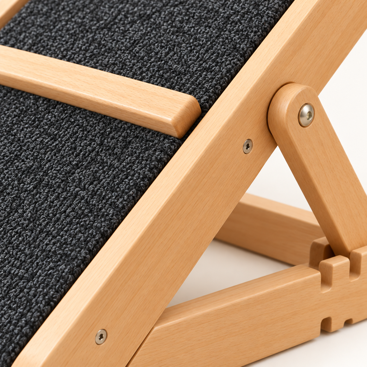 Close-up of ramp traction carpet hinge and wooden rail